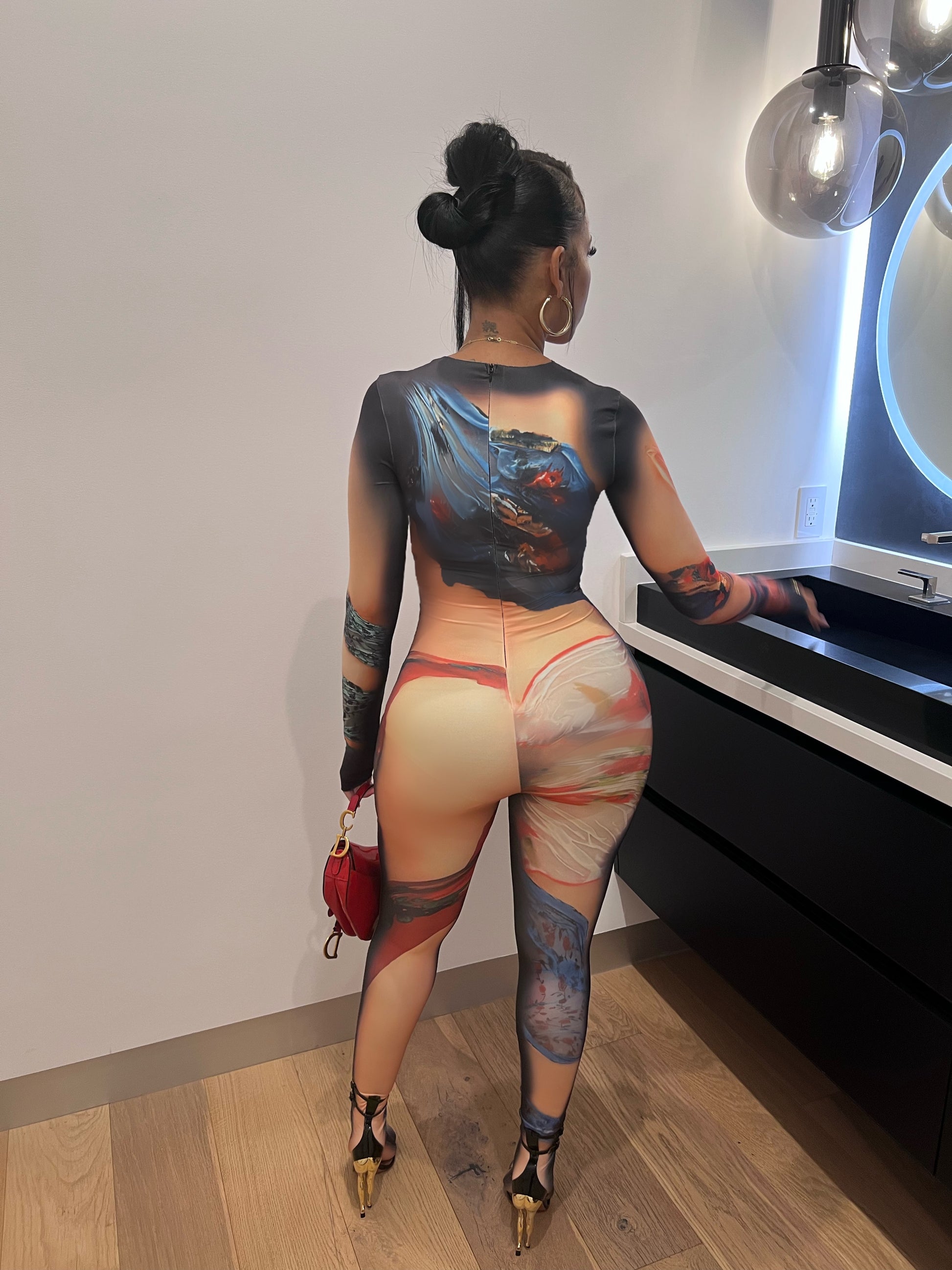 Caught A Body Morphing Jumpsuit